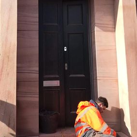 One of our team working on a doorway 